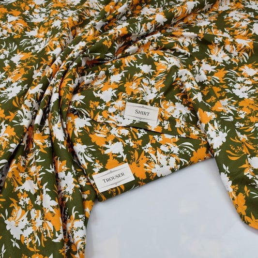 Floral patterned shirt with 'THOUSER' label on a light gray background