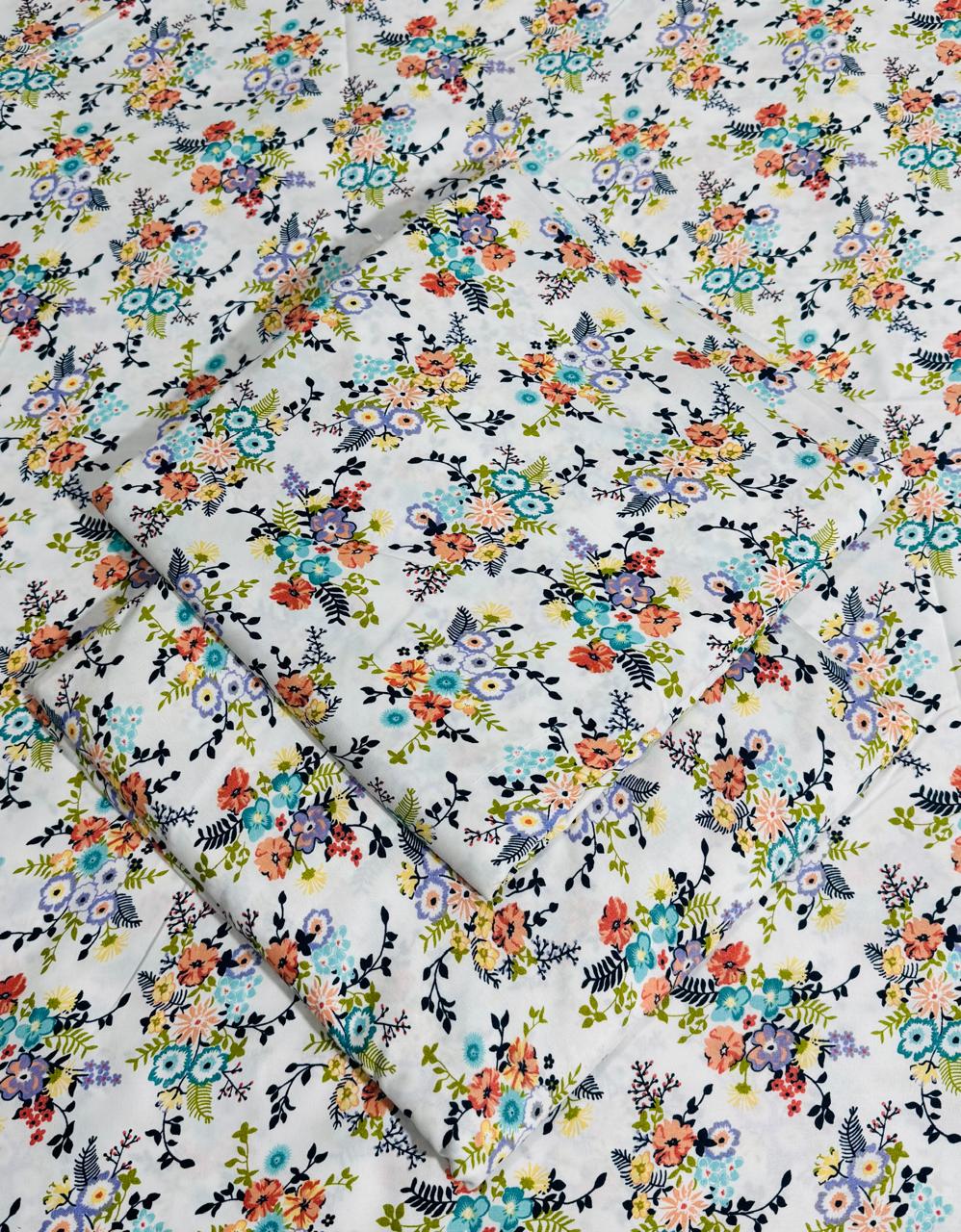 Floral patterned fabric with colorful flowers on a white background