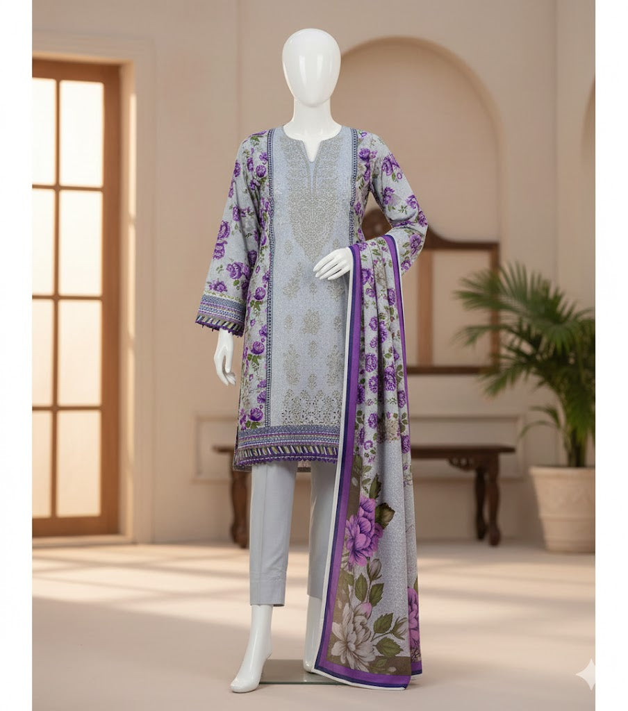 Mannequin wearing a floral dress with a long scarf in a room setting