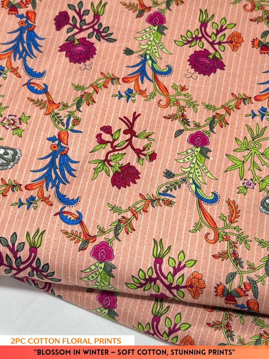 Cotton fabric with colorful floral prints on a pink background