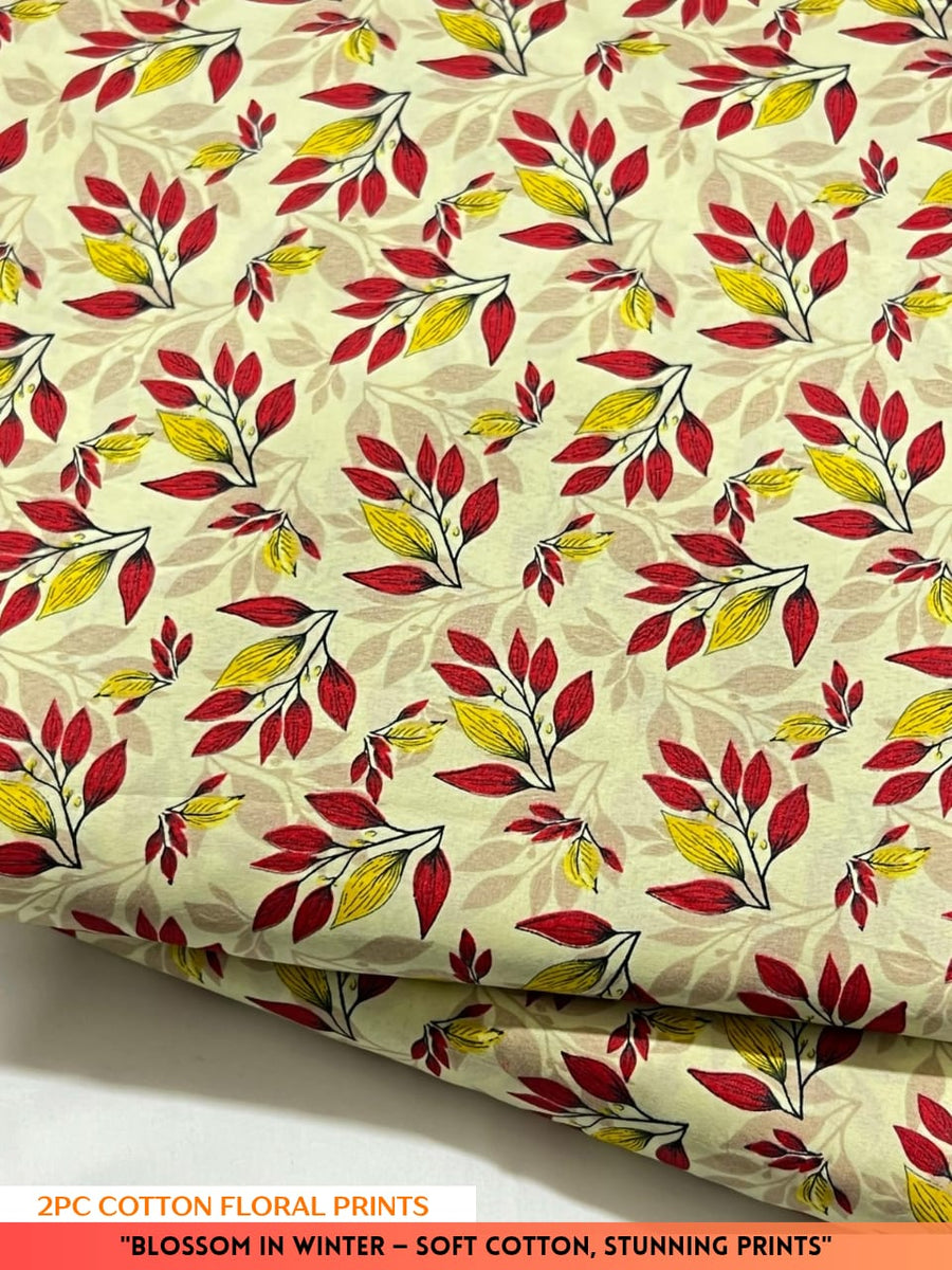 Cotton fabric with red and yellow leaf pattern on a beige background