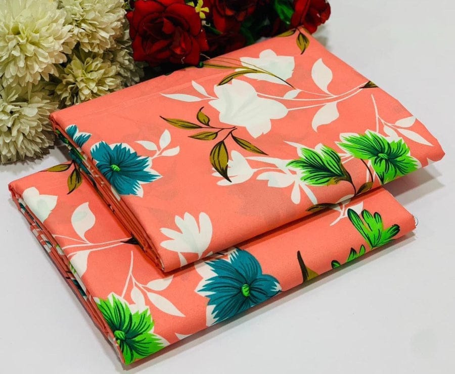 Floral-patterned fabric with green leaves and blue flowers on a white background