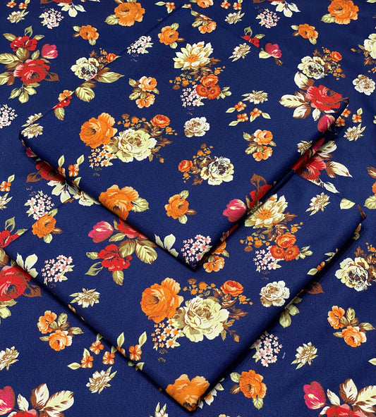 Floral-patterned fabric on a blue background